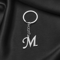 Polished silver stainless steel keychain featuring a large capital letter M pendant - M