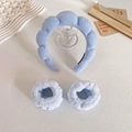 Blue microfiber spa headband and wristband set in a soft fluffy cloud design - Light Blue