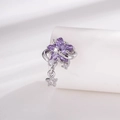 Elegante zilveren kraakbeenpiercing met paarse zirkonia ster hanger en verfijnde details - Paars (Enkel Stuk)