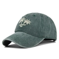 Close-up of coconut tree embroidery on a vintage washed dark green baseball cap - Adjustable / Army Green