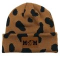 Detail of knitted cow print beanie with MOM leather patch and cute cow icon - Dalmatian Brown/Leopard