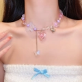 Detailed view of colorful beaded necklace featuring butterfly and heart pendants on a model - 8# Purple Pink Butterfly Heart Style