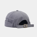 Detalle del gorro docker gris con hebilla metálica ajustable y tejido de lona - Liso-Azul Niebla