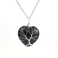 Detail of silver wire wrapped life tree pattern on heart shaped black stone necklace - Silver + Obsidian