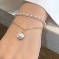 Bracelet double rang doré avec perles blanches et un grand pendentif en perle - 3048
