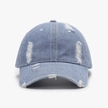 Distressed light blue denim baseball cap with vintage frayed holes and curved brim style - Light Blue