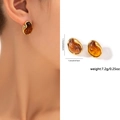 Amber irregular oval stud earrings with gold trim and detailed size measurements - Zjge0582