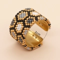 Handgewebter Miyuki-Perlenring mit geometrischem Muster in Gold und Schwarz, 2cm Innenmaß - Gold Schwarz Weiß Grau Geometrisches Muster (MI-R23061404A)