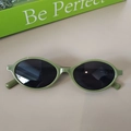 Kids oval sunglasses with glossy grass green frames and dark sun protection lenses - Green