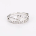 Close-up of double-layered stainless steel ring with heart shape and sparkling crystals - US 6 / Steel