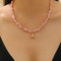 Bohemian pink crushed stone necklace with a gold starfish pendant worn on the neck - KC Gold Pink (3316)