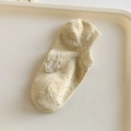 Beige gestreifte Füßlinge mit Logo-Stickerei und rutschfestem Silikon für Damen - Einheitsgröße / Milchiges Gelb