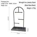 T-shaped black metal jewelry stand with a black marble patterned base for earring display - Arch Jewelry Rack - Black Base Black Frame
