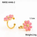 Macro view of 1.1cm pink enamel daisy stud earrings in gold-tone stainless steel - Pink Ear Cuff