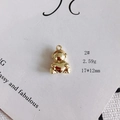 Macro shot of 17x12mm golden hollow bear charm holding a heart on white card background - 2# Heart Bear