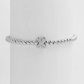 Silver beaded elastic bracelet with a minimalist four-leaf flower charm in 18k glossy finish - Silver X