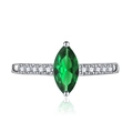 Macro shot of marquise-cut green gemstone ring with side diamond accents on white base - Adjustable Open / Green Zirconia