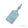 Light blue faux leather luggage tag with airplane icon and adjustable buckle strap - Luggage Tag / Light Blue
