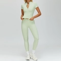 Light green two-piece yoga set featuring a zip-up short sleeve top and high-waisted leggings - S / Top And Bottom / Mint Green