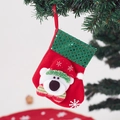Red Christmas stocking with sequin cuff and 3D plush bear hanging on a tree branch - Bear Style
