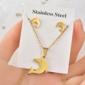 Golden stainless steel jewelry set featuring dolphin pendant necklace and stud earrings - TT-005/Gold Dolphin