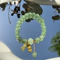 Elegant green jade beaded bracelet with golden peanut charm and clover detail - S048-green Peanut Donglin Jade Beaded Bracelet #sz355