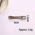Pince à cheveux Y2K nœud évidé en argent, barrette en métal élégante de 6cm pour femmes - Pince Bec de Canard Nœud (X1-449) / 6cm