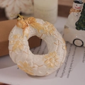 Creamy white Christmas tree wreath ornament with embossed flowers and orange bow - Bow Combination