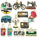 Set of 11 vintage-style alloy enamel pendants featuring retro TV, camera, and bike designs - Mix 12 Styles Set