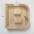Houten spaarpot in B-vorm met transparant paneel, afmetingen 17,9 x 17,9 cm voor decoratie - Letter B