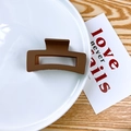 Matte brown rectangular cutout claw clip hair accessory in minimalist resin style - Brown