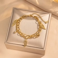 Pulsera de doble cadena de oro 18KGP con colgantes de hojas huecas y acento de diamante fino - Estilo Colgante de Hoja (719) / Dorado