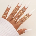 Golden 21-piece ring set featuring butterfly, heart, and pearl designs on fingers - Gold Butterfly Heart Style (5837801)
