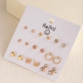 Detail of 9-pair rose gold earring set with butterflies, hearts, and crystals on card - Rose Gold Bow Crystal Heart Earrings (E0205-1)