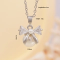 Silver bow necklace with white pearl and cubic zirconia pendant, 40cm plus 5cm chain - Silver
