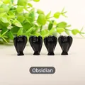 Set of four 2.5cm obsidian guardian angel figurines with a polished black finish - Obsidian