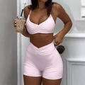 Women's 2-piece yoga set with halter neck sports bra and high-waist shorts in light pink - L / Pink