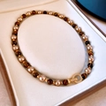 Detail of necklace with brown tiger eye stones, pearls and gold diamond-set ring clasp - 14# Gold Coffee Pearl Inlaid Diamond Buckle Style (18K Gold Plated)
