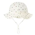 Detail of baby cotton sun hat featuring brown polka dots and adjustable chin strap - White Brown Dots