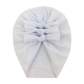 Close-up of soft baby cotton turban hat featuring three knots and knit texture details - White