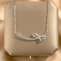 Collier argenté élégant avec pendentif en forme de nœud et zircons brillants - Argent Nœud Papillon Sourire