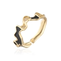 Detailed macro shot of wavy 18K gold plated ring with black enamel and zircons - Gold Black
