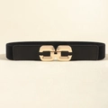 Vue détaillée de la ceinture élastique noire avec boucle métallique dorée polie - Boucle ronde noire