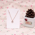 Golden heart necklace with small crystals on white cardboard display card - 6x9cm White Cardstock (100 Sheets)