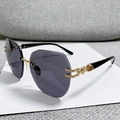 Lunettes de soleil polygonales sans monture avec verres gris et branches baroques - Monture Or Noir Gris