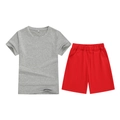 Kids summer casual set featuring a grey heather t-shirt and vibrant red sports shorts - Top And Bottom / Grey/Red / 100cm