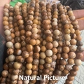 Macro shot of 8mm natural picture jasper round beads showing unique stone patterns - Natural Picture Jasper 4mm (Approx. 90pcs) Strand