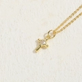 Minimalist gold-plated cross necklace featuring a sparkling cubic zirconia pendant - Cross Zirconia