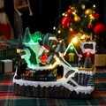 Detailed view of musical Christmas snow mountain box with glowing LEDs and rotating train - Double Rotating Santa Style