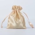 Golden satin drawstring gift bag with a glossy silk texture and elegant matching ribbon - 7*9cm / Champagne Gold